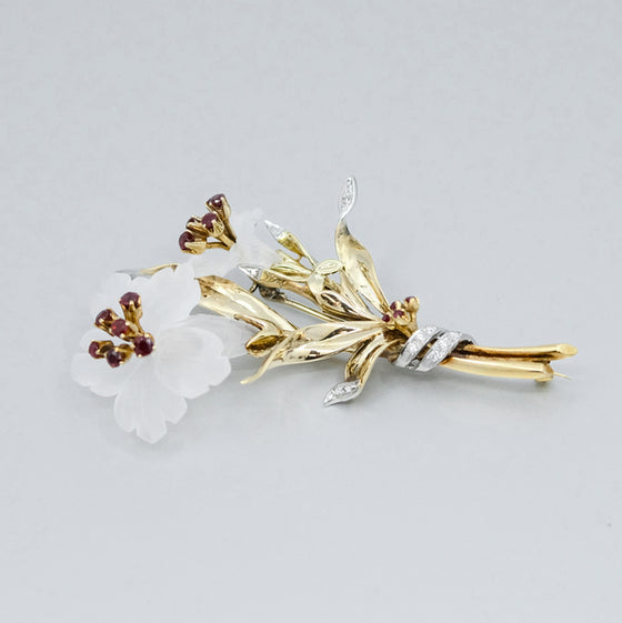 A Flower platinum and 14 yellow gold brooch