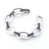  A fine roped edge detail set on central links gives this distinctive mixed link bracelet a sophisticated feel.