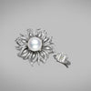 An Australian Cultured South Sea Pearl and Diamond Brooch in 18ct White Gold