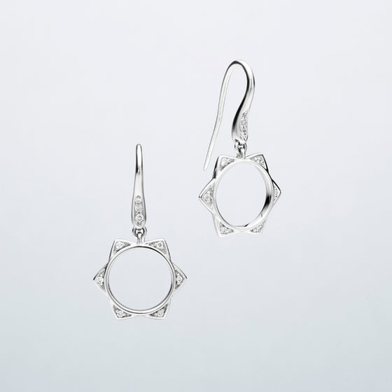 'BUNDA Star' Diamond Earrings in 18ct white gold. A pair of BUNDA Star diamond earrings in 18 carat white gold, featuring bead set, round brilliant cut diamonds on each point of the star, fitted with a thread-set diamond hook.