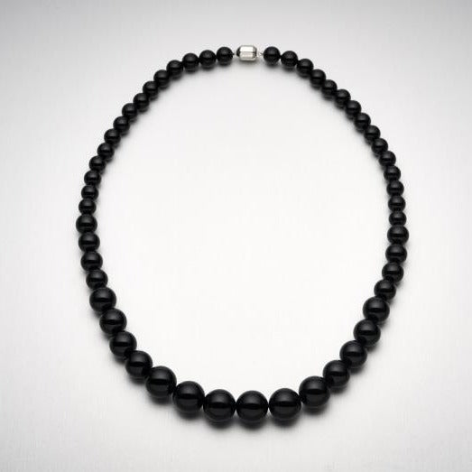 A BUNDA 'Strand' with black agate beads and sterling silver clasp.