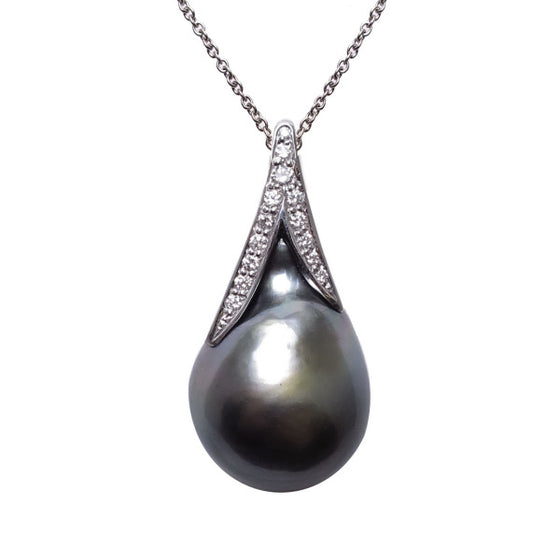 A BUNDA 'Caelum' Cultured Tahitian pearl and Diamond Pendant in 18 carat white gold, featuring a baroque shaped Tahitian pearl, set with a diamond threadset cap that follows the curve of the pearl and is fitted with an 18 carat white gold trace chain.  The pearl measures approximately 15.00 - 22.98mm, is green in colour, with a clean skin and an excellent lustre.  Characteristics of diamonds: 13 = 0.16ct, F colour, VS clarity.