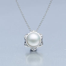  'Star' Cultured Mabe Pearl and Diamond pendant