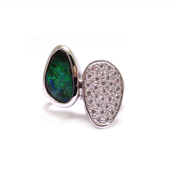 A BUNDA 'Couture' ring handcrafted in 18ct white gold, featuring a bezel set, Australian boulder opal and pave set, round brilliant cut diamonds.  Characteristics of Opal: 1 = 1.87ct. Origin: Queensland, Australia.  Characteristics of diamonds: 30 =0.31ct, F colour, VS clarity.  Total weight of Ring: 10.65g